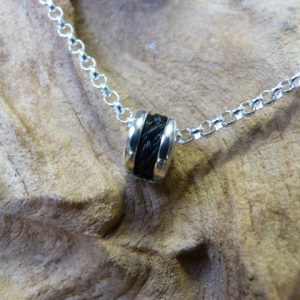 Zilveren bedel met paardenhaar